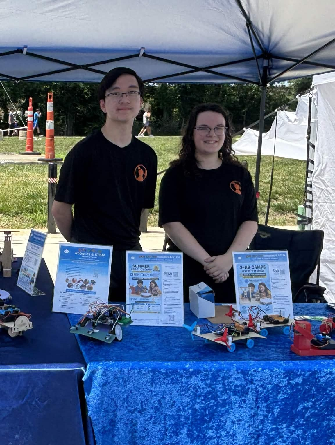 Anthony and Sage volunteering at CarmelFest (left to right)