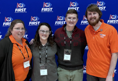 Mrs. Masiuk, Sage, Abbey, and Ryker together volunteering (left to right)